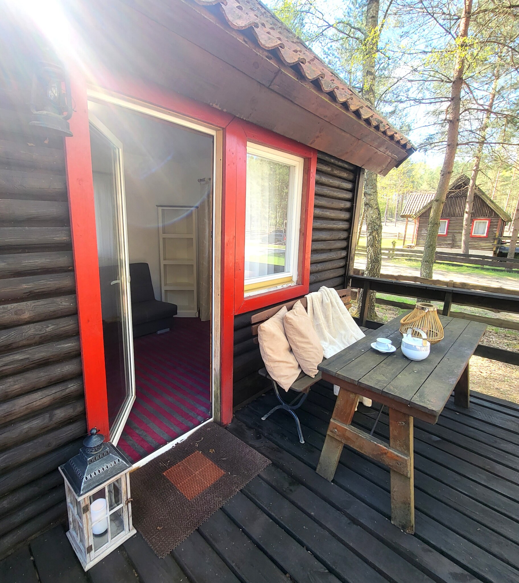 Domki i Pokoje na Mazurach, Basen, Restauracja domek typ c taras 1